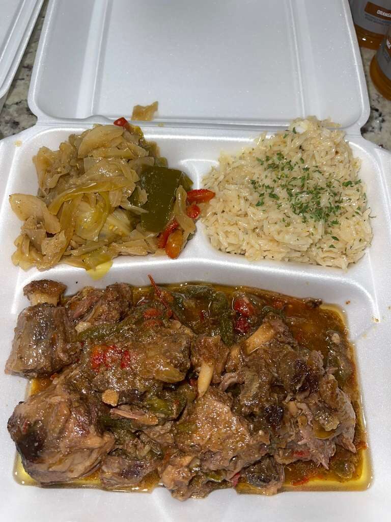 Southern smothered meat with rice and cabbage